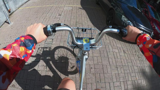 A view from the first person to the steering wheel, hands and road. photo