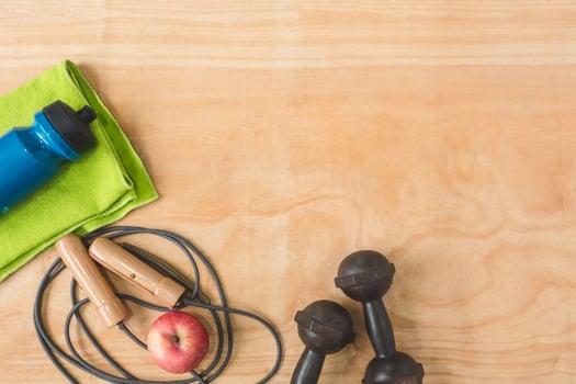 Top view of Sport stuff on wooden table background, Fitness lifestyle concept, Free space for text photo