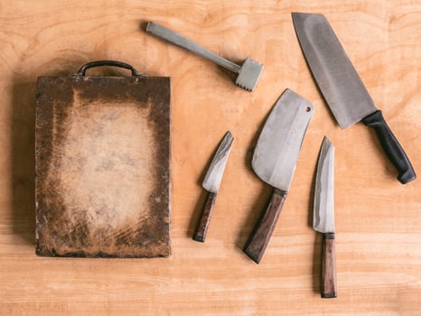 Kitchen utensils on wooden table background. photo