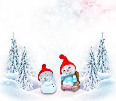 Happy snowman on a winter landscape background. photo