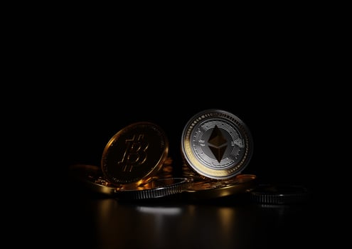 bitcoin and ethereum on black background, 3d bitcoin coins photo