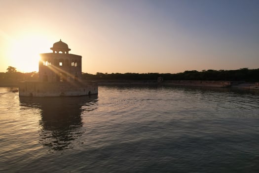 High Angle Aerial View of Historical Mughals Hiran Minar and village of Sheikhupura Pakistan at Sunset photo