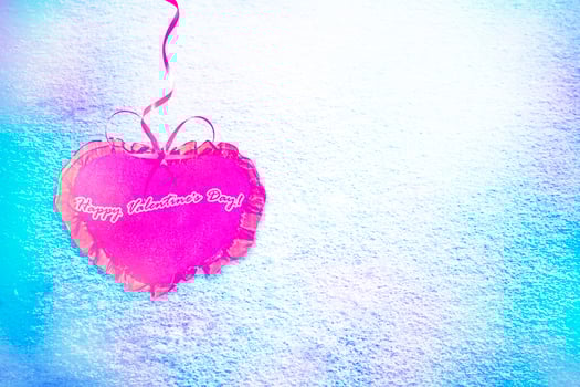 Background from snow. Heart. photo
