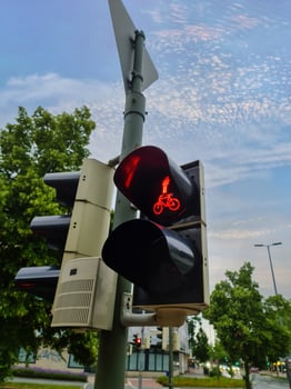 Green and red traffic lights for pedestrian and bicycles photo