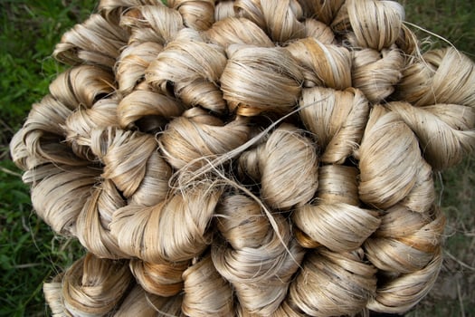 thick brown bundle of raw jute fiber Texture Background photo