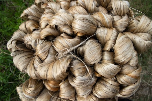 thick brown bundle of raw jute fiber Texture Background photo