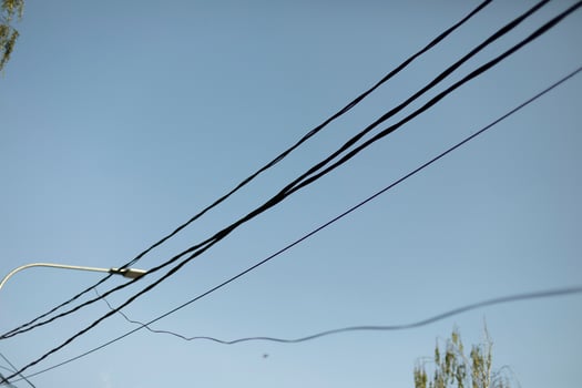 Wires in sky. Electrical wires against sky. photo
