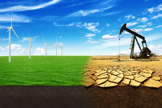 The concept of green energy windmills in a beautiful field. Oil pump in sandy field with cracks. Energy Production leads to the destruction of the world photo