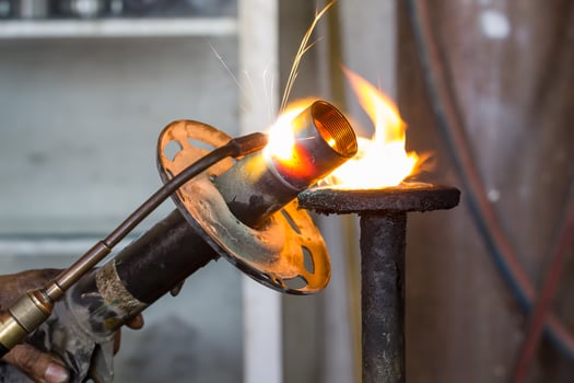 Welders were repairing Shock absorbers photo