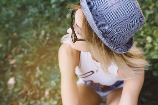 beautiful girl sitting and looking to the side photo