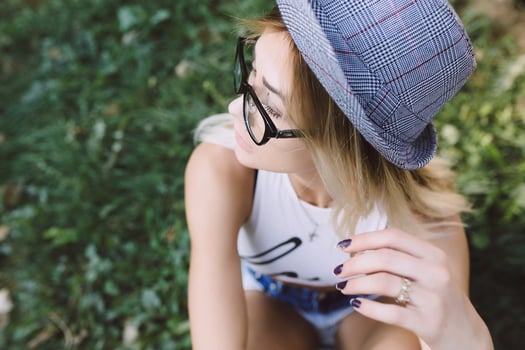 beautiful girl sitting and looking to the side photo