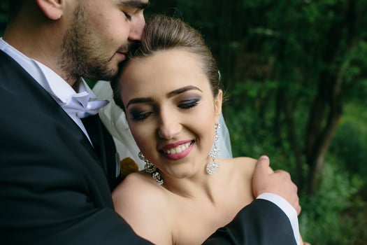 Beautiful wedding couple on nature photo
