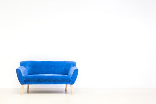 Minimal concept of living interior with blue sofa photo