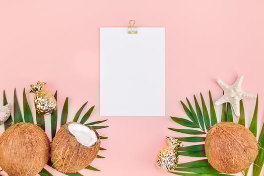 Palm leaves and coconuts on pink mockup photo