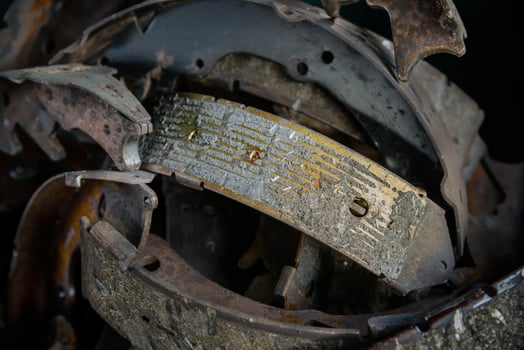 Many old used brake shoes photo