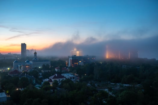 View of residential buildings at the sunset with cloudy sky. photo
