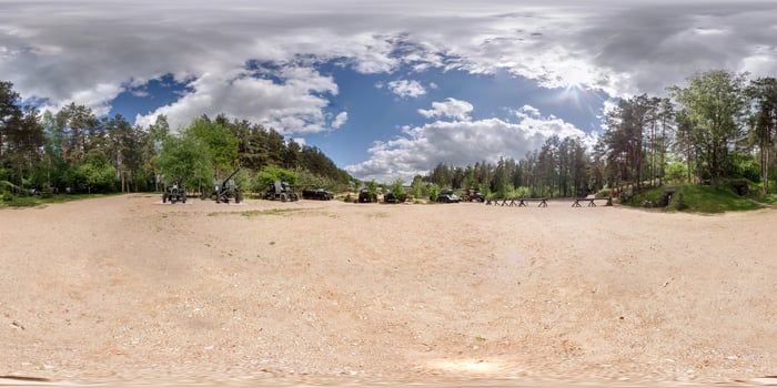 Panorama in open air museum of armored vehicles partisan camp.  Full 360 by 180 degree seamless spherical panorama in equirectangular equidistant projection. VR AR content photo