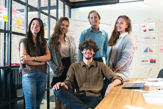 Portrait of creative business team. Hipster Creative Startup Young business people in modern office. photo