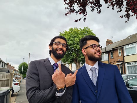 Young Males young Businessmen are Posing in a Street of Luton England UK photo