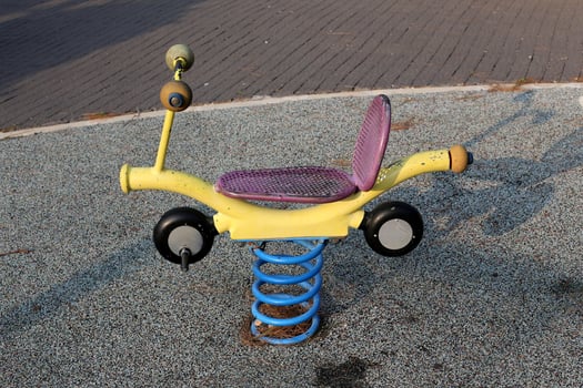 Toys and sports equipment on a playground in Israel. photo