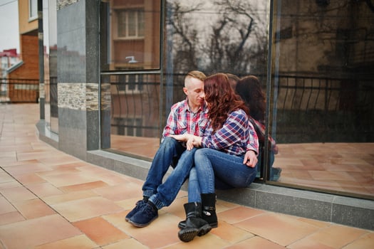 Stylish couple wear on checkered shirt in love together. photo