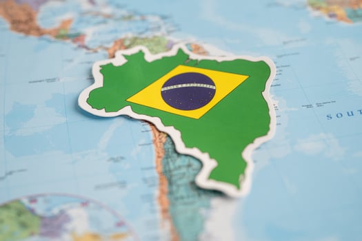 Bangkok, Thailand - February 1, 2022 Brazil and Ukraine flag on world map background. photo