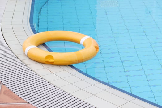 an empty swimming pool with poll stair photo
