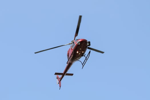 Helicopter flying over City photo