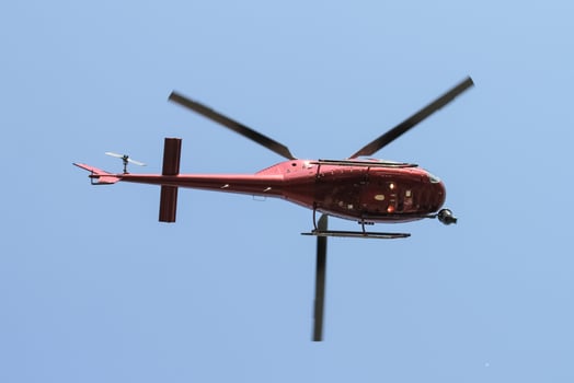 Helicopter flying over City photo