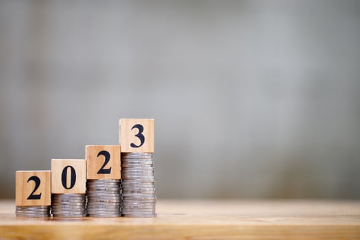 Money saving and investment concept for new year 2023 with coins stacking and copyspace photo