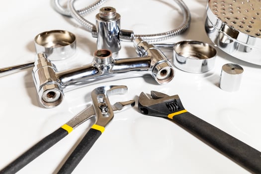shower faucet details and adjustable wrenches photo