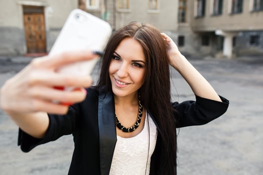 beautiful girl makes self in the city photo