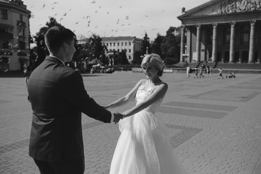 Young wedding couple walking photo
