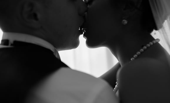 Beautiful European bridal couple in the hotel room photo