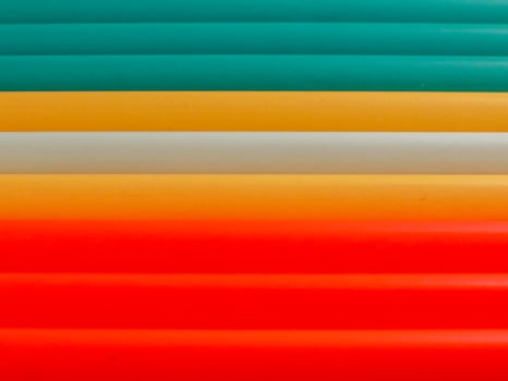 Close-up view of colorful new carbon pencils isolated photo