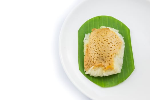 sticky rice with steamed custard on banana leaves and dish, sweet sticky rice, Thai sweet dessert, original Thai food photo
