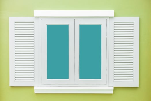 White window classic vintage on the color light green wall background photo