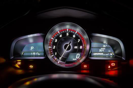 Modern car instrument dashboard panel or speedometer in night time photo