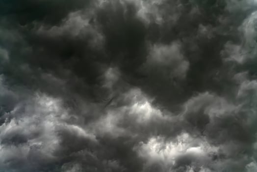Rain clouds and black sky textured background photo