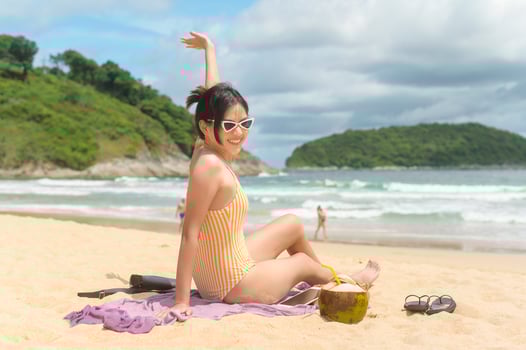 Young Beautiful woman in Bikini enjoying and relaxing on the beach,  Summer, vacation, holidays, Lifestyles concept. photo