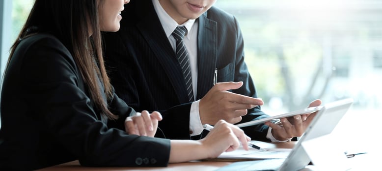 Fund managers team consultation and discuss about analysis Investment stock market by digital tablet. photo