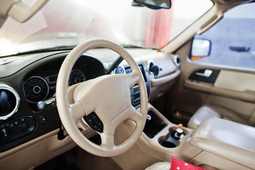 Interior of American SUV car on stand in workshop of service station. photo
