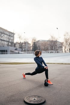 Full length shot of fit young woman doing stretching workout. photo