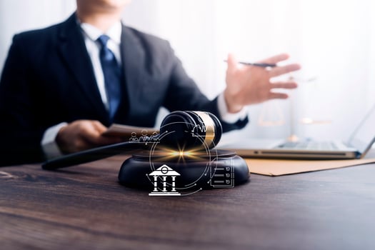 Business and lawyers discussing contract papers with brass scale on desk in office. Law, legal services, advice, justice and law concept picture with film grain effect photo