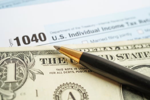 Tax form 1040 U.S. Individual Income Tax Return, business finance concept. photo