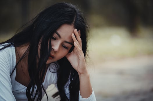 Beautiful thai woman very sad from unrequited love,She rethink and think over about love,vintage style,dark tone,broken heart,asian girl photo