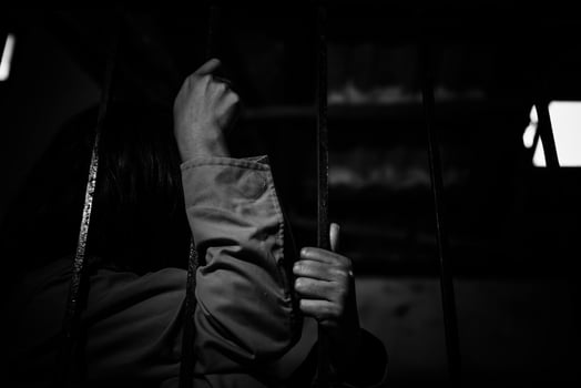 Hands of women desperate to catch the iron prison,prisoner concept,thailand people,Hope to be free,If the violate the law would be arrested and jailed. photo