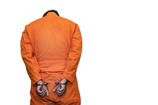Portrait of prisoner on white background,Asian bad guy,The criminal was arrested by the police. photo