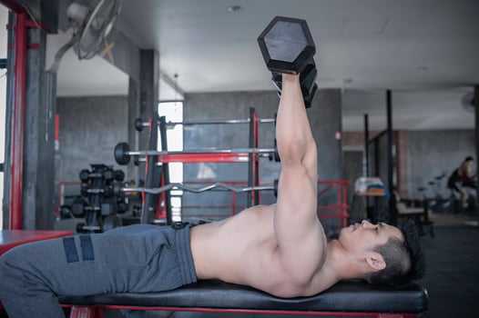 Portrait of asian man big muscle at the gym,Thailand people,Workout for good healthy,Body weight training,Fitness at the gym concept photo