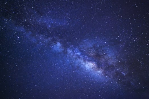 Milky way galaxy with stars and space dust in the universe, Long exposure photograph, with grain. photo